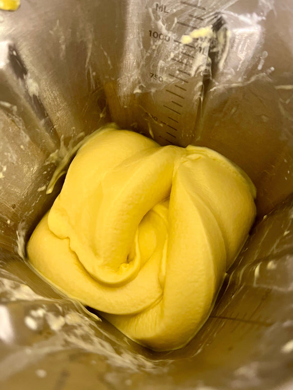 mango ice cream inside the blender