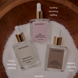 Behrhaus magnesium oil trio including original, rose, and vanilla oils displayed in glass dropper bottles on a bowl of magnesium salt, highlighting soothing, cooling, and warming benefits.