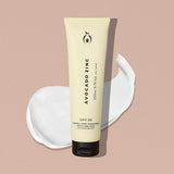 Avocado Zinc SPF 30 Natural Body Sunscreen tube with creamy texture swatch on neutral background