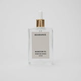 Behrhaus Magnesium Oil in a clear glass bottle with a gold pump, labeled “Magnesium Oil for body, scalp, and nails (3.4 fl oz),” displayed against a clean white background.