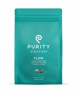 Teal coffee package labeled 'Purity Coffee Flow' on a white background